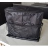 Organisateur de siège auto noir avec sac thermique intégré et poches de rangement.
