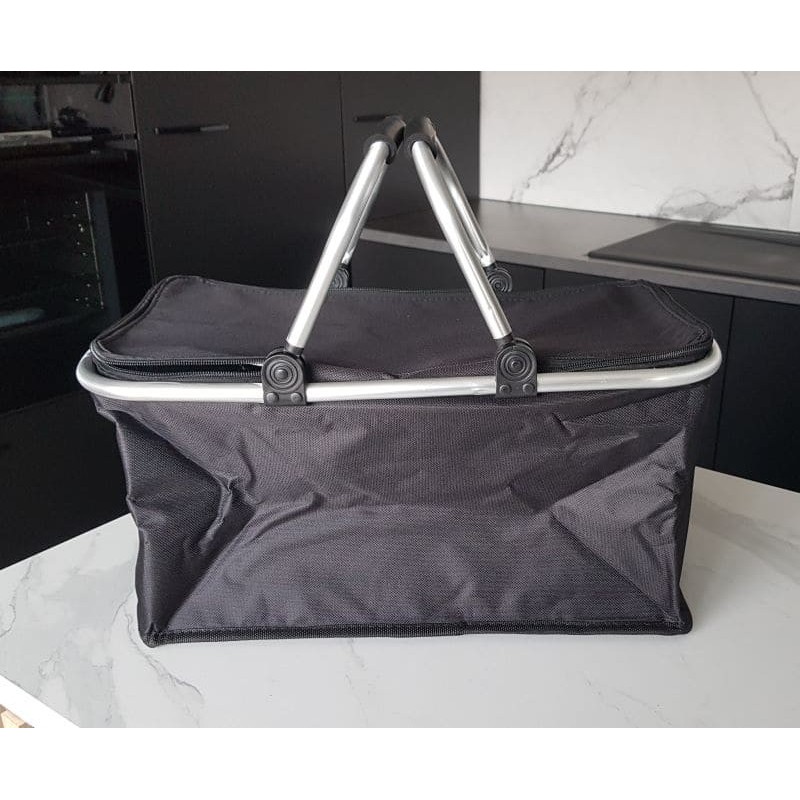 Panier pique‑nique pliable isotherme, idéal pour conserver aliments et boissons au frais.