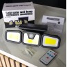 Lampe solaire 100 COB IP67 orientable avec détecteur de mouvement et télécommande.