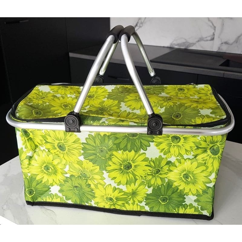 Panier pique‑nique pliable isotherme vert à fleurs – idéal pour garder vos aliments au frais ou au chaud.