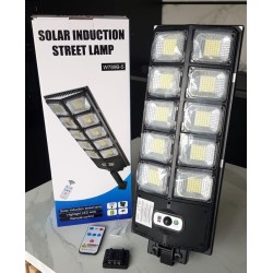 Lampadaire solaire LED avec détecteur de mouvement, télécommande et 3 modes – longueur 57 cm.