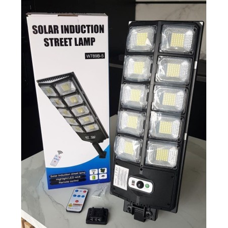 Lampadaire solaire LED avec détecteur de mouvement, télécommande et 3 modes – longueur 57 cm.