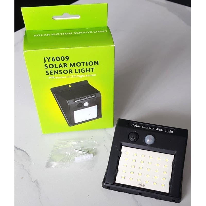 Lampe solaire 30 LED SMD étanche avec détecteur de mouvement et de luminosité.