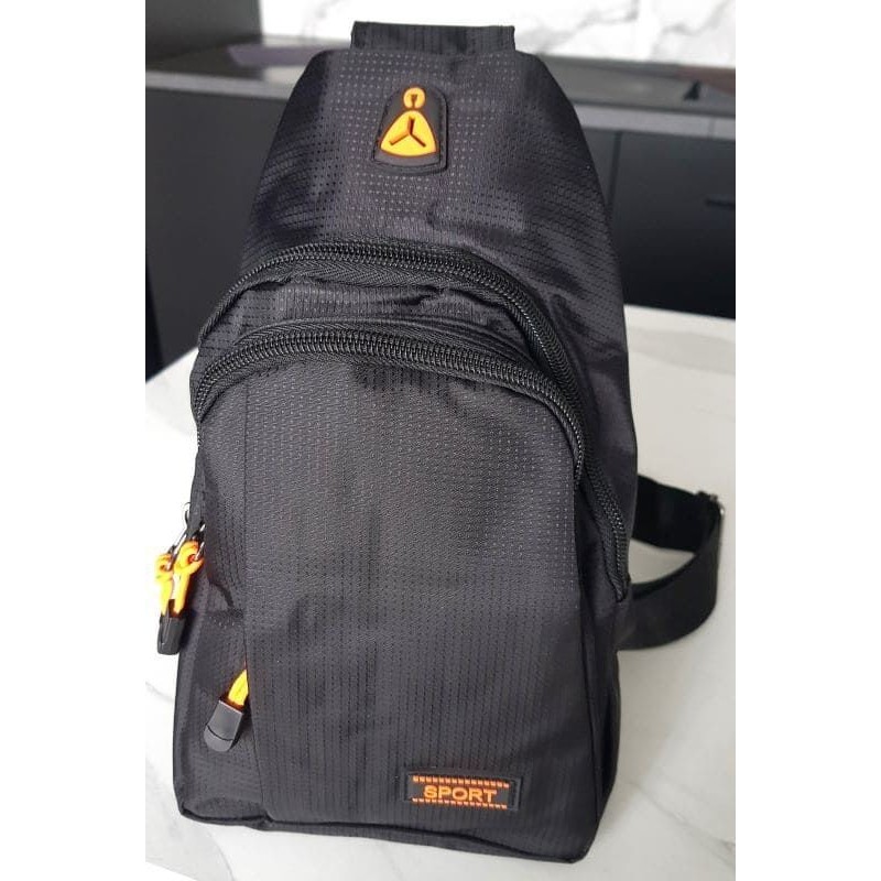Sac à dos compact noir à une seule bandoulière – unisexe, pratique et multi‑poches